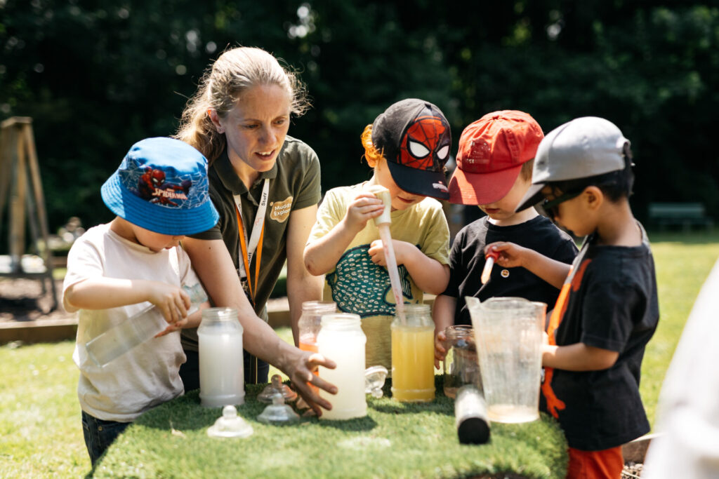 A member of staff with some children